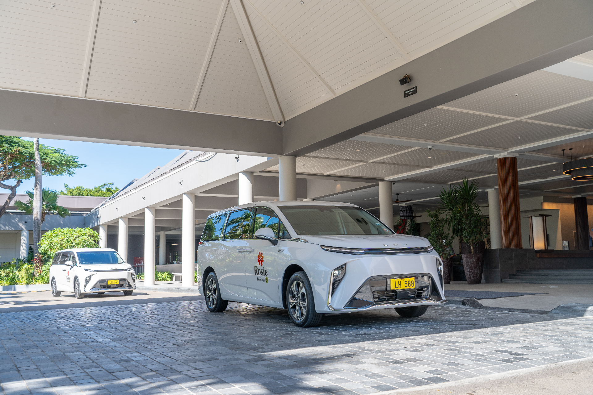 White electric van at Sheraton Fiji resort entrance